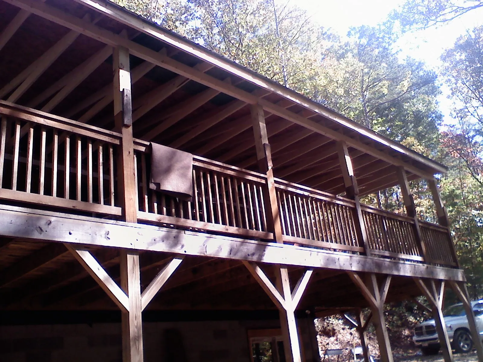 Timber framing under a new elevated porch and deck — Roof Leak Repair in New Albany by Roofing Brothers